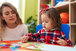 Toddler exploring daycare activities
