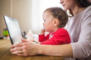 Child playing with educational toys away from screens