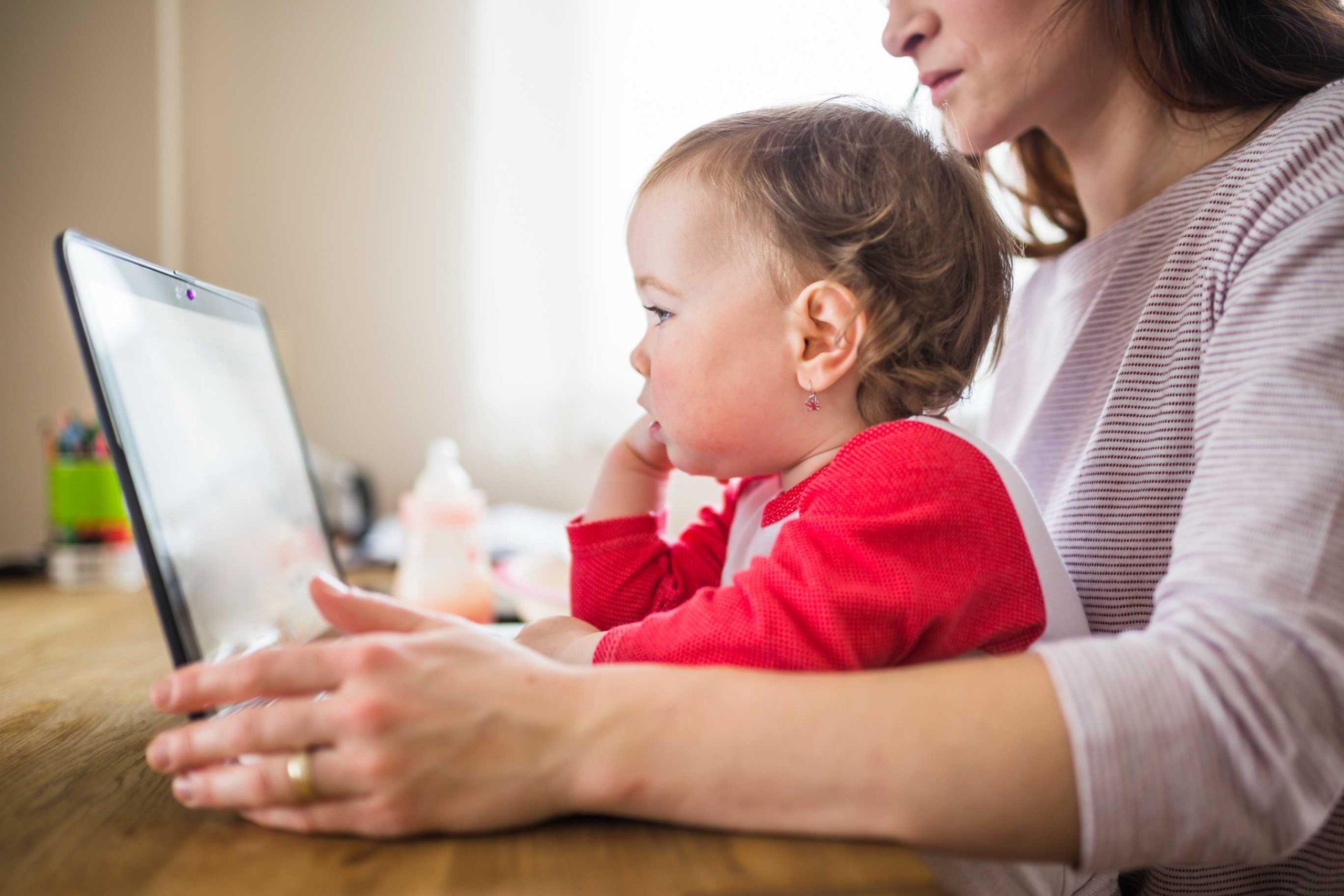 Child playing with educational toys away from screens