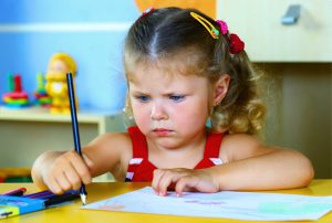 Child learning through play at preschool